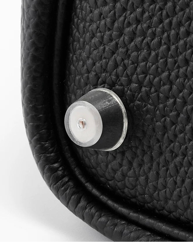 Orliná clear stud protector protecting Hermès Birkin 25 metal feet from scratches