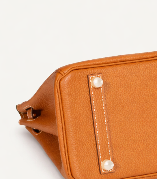 Orliná clear silicone feet stud protector for Hermès Birkin 25, Kelly 25 and other Hermès bags. Invisible scratch protection accessory